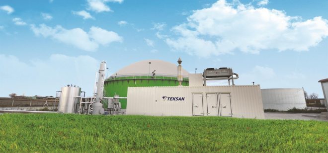 a large white building with a green dome